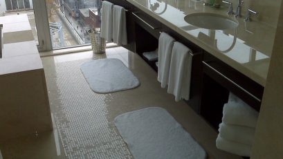 Hotel Ensuite Bathroom, Polished Marble Floor and Vanity - Scope of work: sand, polish and protect floor and vanity with a penetrating sealer.